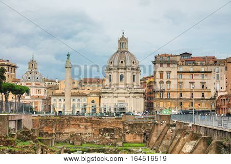 ROME - NOVEMBER 07: Santa Maria di Loreto church and Colonna Traiana with people on November 7 2016 in Rome Italy.