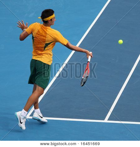 MELBOURNE, AUSTRALIA - 7 marzo: Bernard Tomic dell'Australia nella sua vittoria contro Lee Hsin-Han di T cinese
