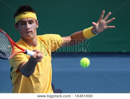 MELBOURNE, AUSTRALIA - 7 marzo: Bernard Tomic dell'Australia nella sua vittoria contro Lee Hsin-Han di T cinese
