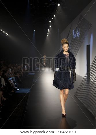 MELBOURNE, AUSTRALIA - MARCH 19: A model showcases designs by Michael Angel in the 2010 L'Oreal Melbourne Fashion Festival at Central Pier, Docklands on March 19, 2010 in Melbourne, Australia