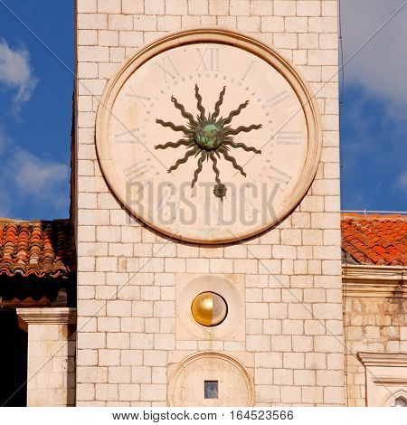 Famous clock tower of Dubrovnik, Croatia. The Clock Tower was built in the heart of the old city Dubrovnic by the main street of the Stradun in the 15th Century. square toned image