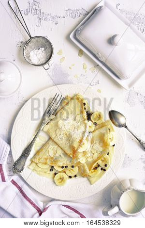 Crepes With Banana And Chocolate Chips.top View.