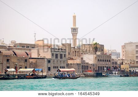 Boats on the Dubai Creek in the heat of the summer
