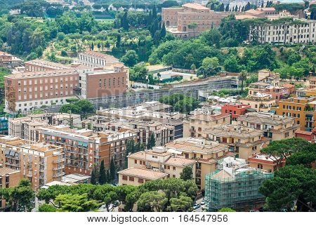 Aerial view of the buildings and streets from the roof point of The Papal Basilica of St. Peter in Vatican city Italy