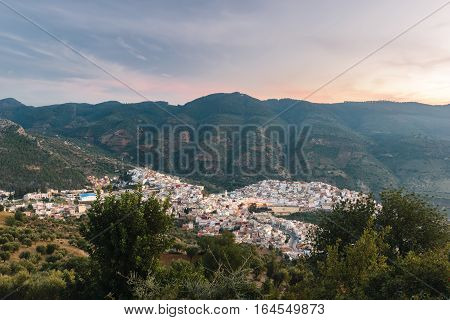Panoramic view over the holy and historical town Moulay Idriss Zerhoun at sunset, Morocco.
