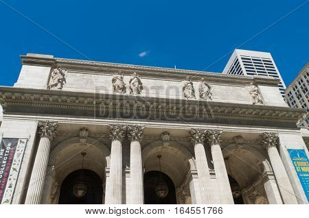 NEW YORK - APRIL 30 2016: Public library exterior at 5th avenue. It is a public library system in Midtown Manhattan with nearly 53 million items