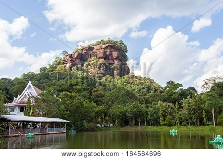 Phu tok mountain or Wat Jetiyakiree Viharn Temple with wooden trail round of the 7 floors mountain at Bueng Kan Province Thailand