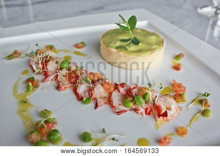 Lobster and green pea tart with fresh salad