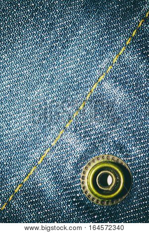 Blue jeans texture background and button and seam