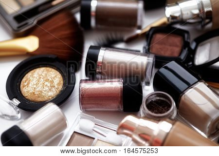 Makeup tools and accessories. Brow eyeshadows naturel skin foundation for clean ton on face nail polish make-up brushes.