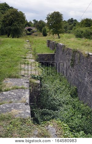 Siddington Third Lock looking towards Second Lock and Upper Siddington Bridge Thames & Severn Canal Cirencester Gloucestershire