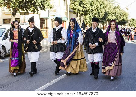 QUARTU S.E., ITALY - September 17, 2016: Parade of Sardinian costumes and floats for the grape festival in honor of the celebration of St. Helena. - Sardinia