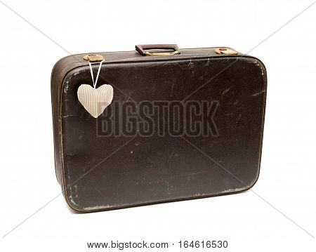 Vintage red suitcase isolated on white background