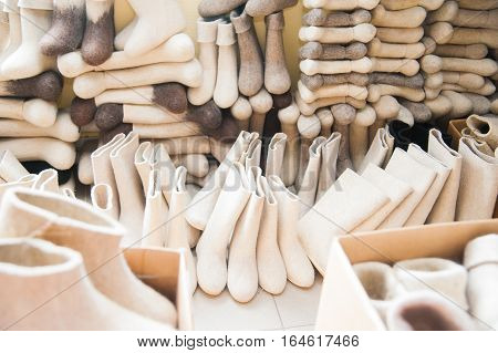 Felt boots on market stand. Valenki are traditional Russian winter footwear.
