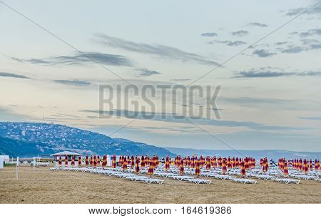 Albena, Bulgaria - June 13, 2016. View Of The Black Sea Shore. Green Hills With Houses, Blue Sea Wat