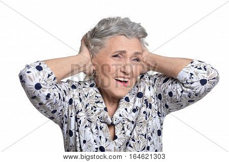 portrait of beautiful mature woman, posing against white background