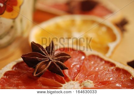 Still life with grapefruit, lemon and star anise