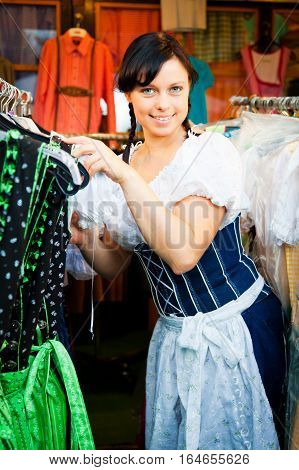 young woman shopping for a new dirndl