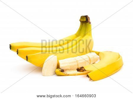 banana and banana slices and skin on white background