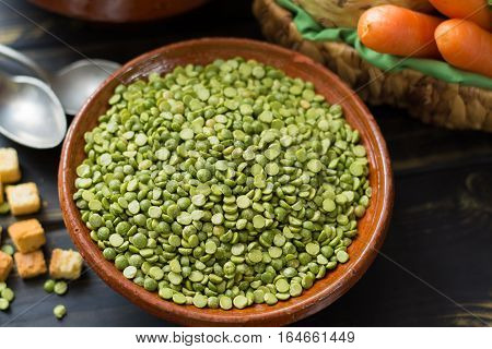 Ingredients for dried split pea vegetarian soup - carrot celery root onion parsley