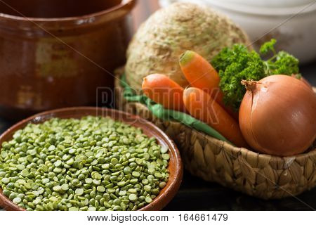 Ingredients for dried split pea vegetarian soup - carrot celery root onion parsley