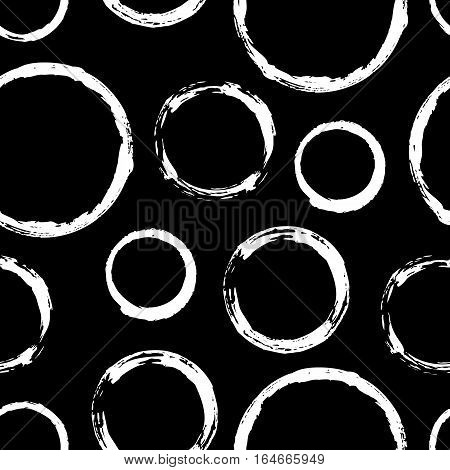 Seamless pattern with grunge circles. Hand drawn round shapes background. Black white brush stroke texture. Geometric graphic design element. Scrapbook wallpaper. Vector illustration