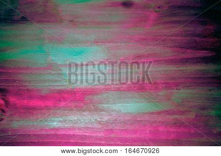 Background of pine wood coloured with streaks in view of its natural pattern
