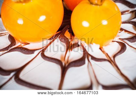Delicious cake on a wooden black background