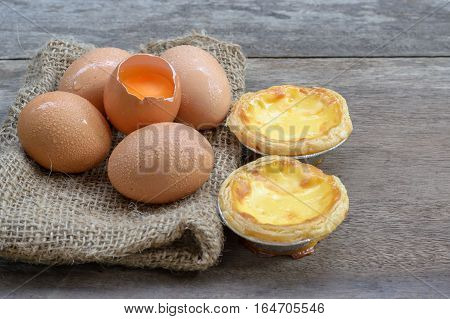 Egg tart custard sweet delicious dessert on wood table