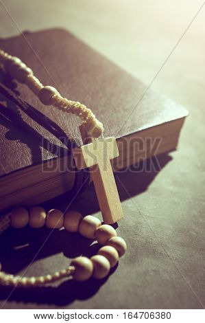 Catholic Rosary Beads With Old Book On Cement Table Prayer, Rosary Background Concept In Vintage Ton