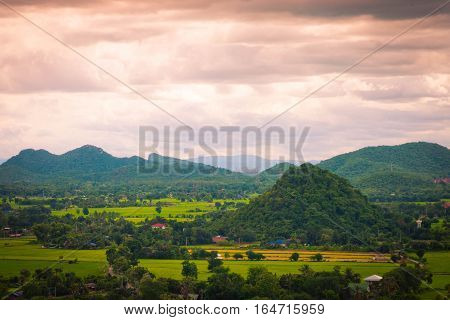 Thailand landscape of rural city and mountain under the cloudy sky