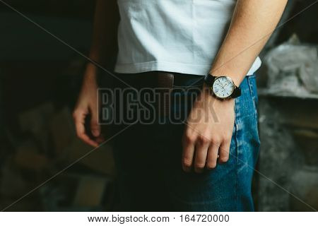 fashionable modern masculine look classic jeans and a white T-shirt