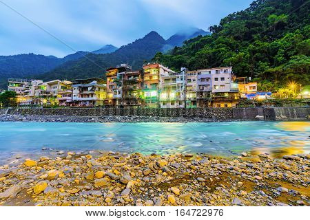 Riverside view of Wulai hot spring village at night