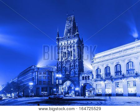 PRAGUE CZECH REPUBLIC - JANUARY 8 2017: Winter view of The Powder Tower and the Municipal House at the Republic Square in Prague. The Old Town is famous destination in Prague. Blue colored
