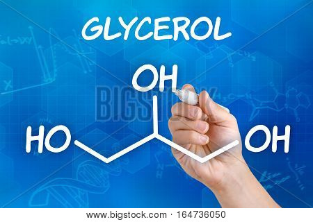 Hand With Pen Drawing The Chemical Formula Of Glycerol