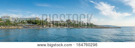 Limassol Cyprus - October 25 2016: People enjoying the beach on a warm and sunny day at a beach in Limassol
