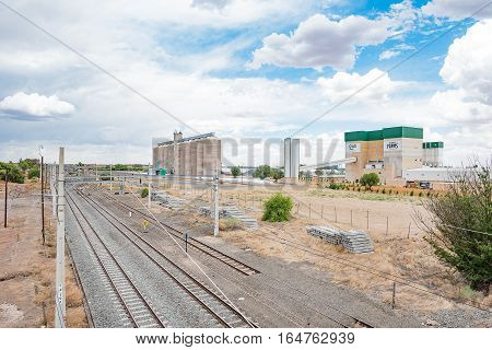 MODDERRIVIER SOUTH AFRICA - DECEMBER 25 2016: The railroad station and grain silos at Modderrivier a village in the Northern Cape Province