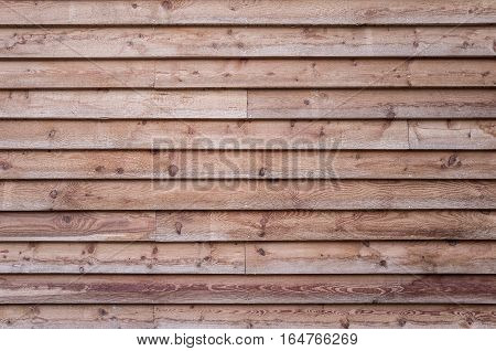 Spruce wood background, wooden slats, spruce wood house facade