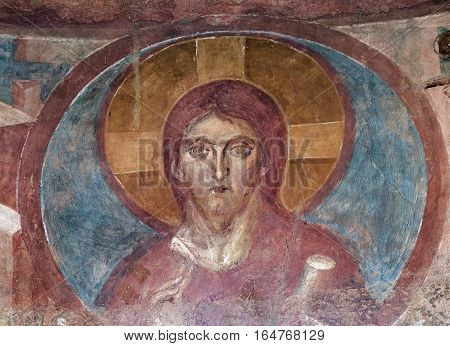 CASTELSEPRIO, ITALY - JUNE 25, 2016: The archeological area of Castelseprio (Varese Lombardy Italy): ruins of a village destroyed in the 13th century. Unesco World Heritage Site. The church mural paintings.