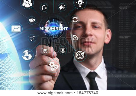 Business, Technology, Internet And Network Concept. Young Businessman Working On A Virtual Screen Of