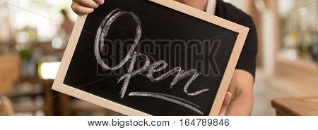 Blackboard With Chalk Writing Open