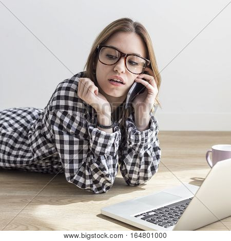 Girl working with the computer from her house