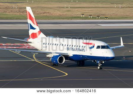DUSSELDORF GERMANY - DEC 16 2016: British Airways CityFlyer Embraer ERJ-170STD arriving at Dusseldorf airport.