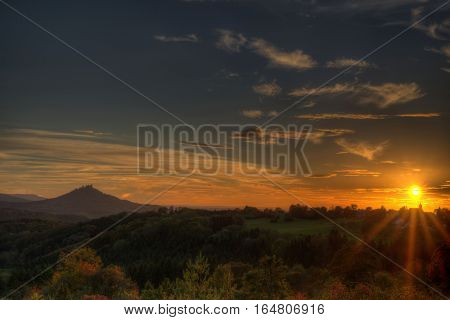 Sunset at the swabian alb with view to the castle Hohenzollern