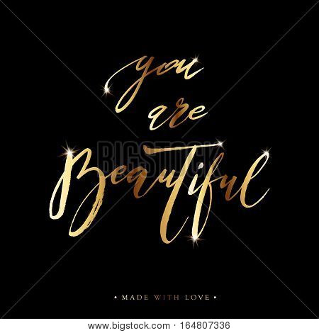 You are beautiful card. Hand drawn gold shiny lettering background. Ink illustration. Modern brush calligraphy. Isolated on black background. Compliment for women. Vector illustration stock vector.