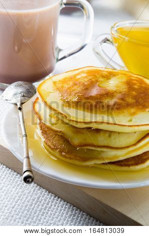Mug Of Cocoa, Silver Spoon, Honey And Pancakes