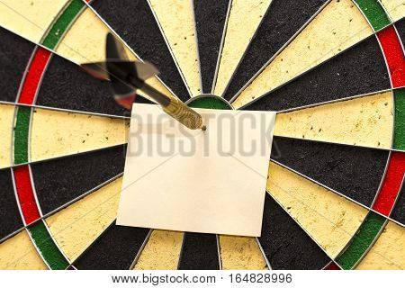 Darts With Dart Which Was Pinned A Sheet Of Paper For Labels