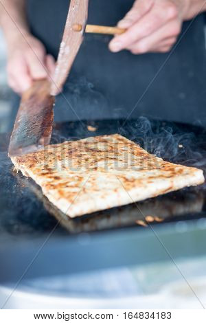 Crepe Folded To A Rectangle With Wooden Tools
