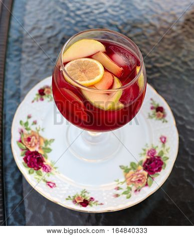 Homemade delicious sangria with orange and raspberry.