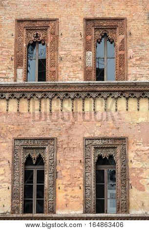 Old window in palace on Piazza Sordello The historic city center of Mantova Lombardy .Italy